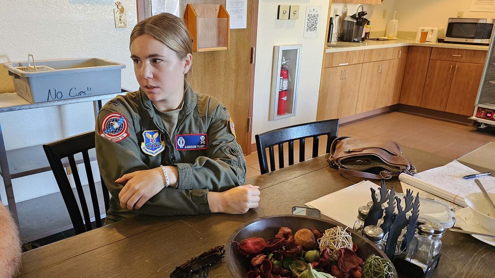 Lt. Addison Flint sits at the table in the lounge/dining area. Flint didn't put missileer at the top of her preference list starting out, but says she would now. With lots of downtime, the men and women who man the Alpha 01, typically have time to work on degree programs, as well as start side hustles. Addison's side hustle is a figure skating TikTok, and she finished a masters in management with an entrepreneurship focus.