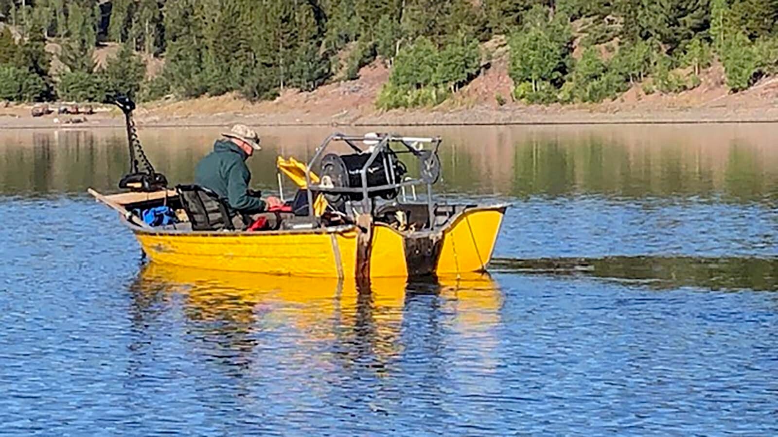 John Linn, leader of the underwater team for Tip Top Search and Rescue (TTSAR), on an underwater search mission in Wyoming.