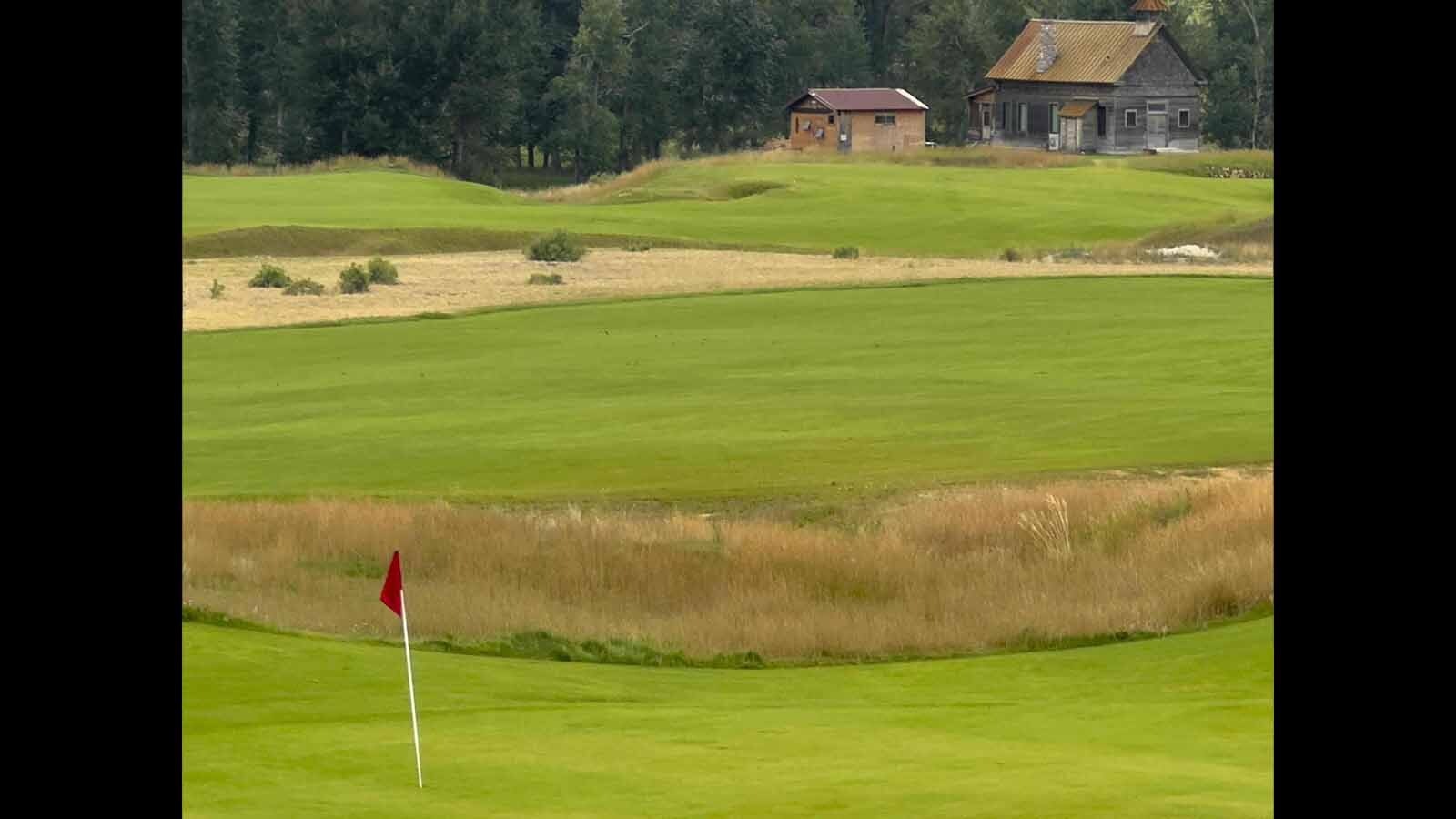 The locals around Twin Bridges call it Charles Kurault’s infamous “Mistress Cabin,” and it’s now just off the fairway at a new golf course on the banks of the Big Hole River.