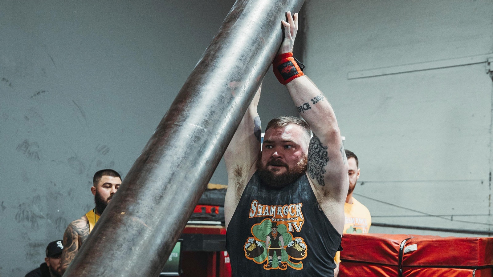 Mitch Godwin trains by lifting a huge steel pole.