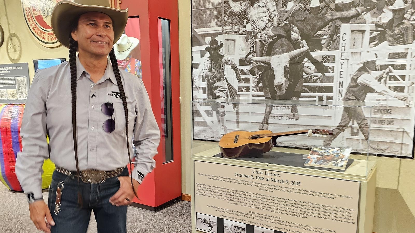 Yellowstone TV actor Moses Brings Plenty at the Chris Ledoux exhibit at Cheyenne Frontier Days Old West Museum.