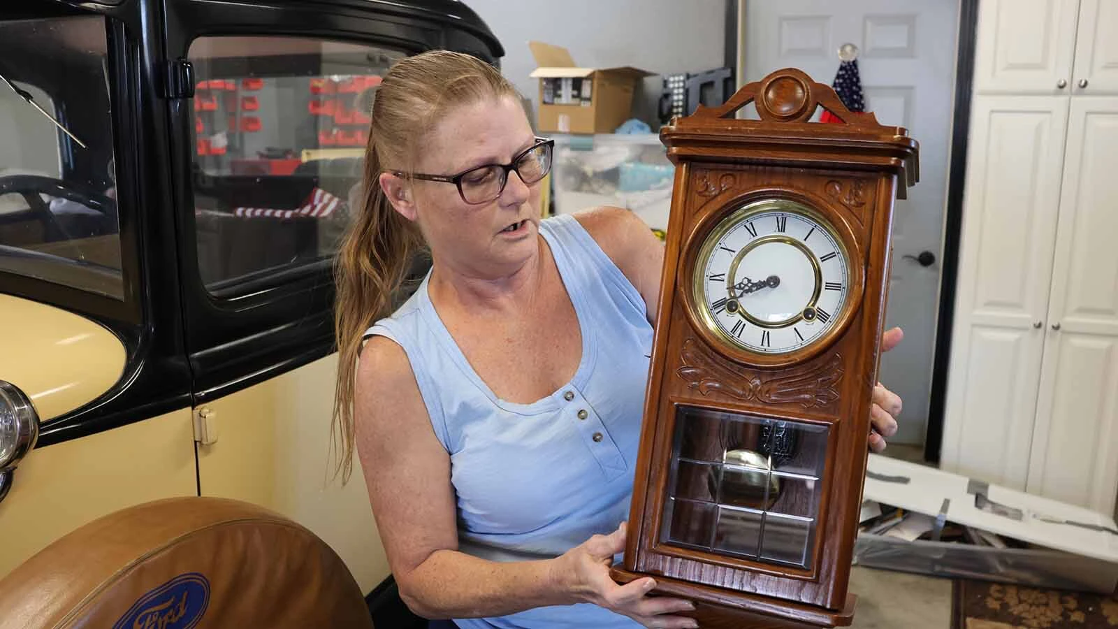 Dale Corkill liked to fix clocks. Amanda Lake holds one that she held on to. 