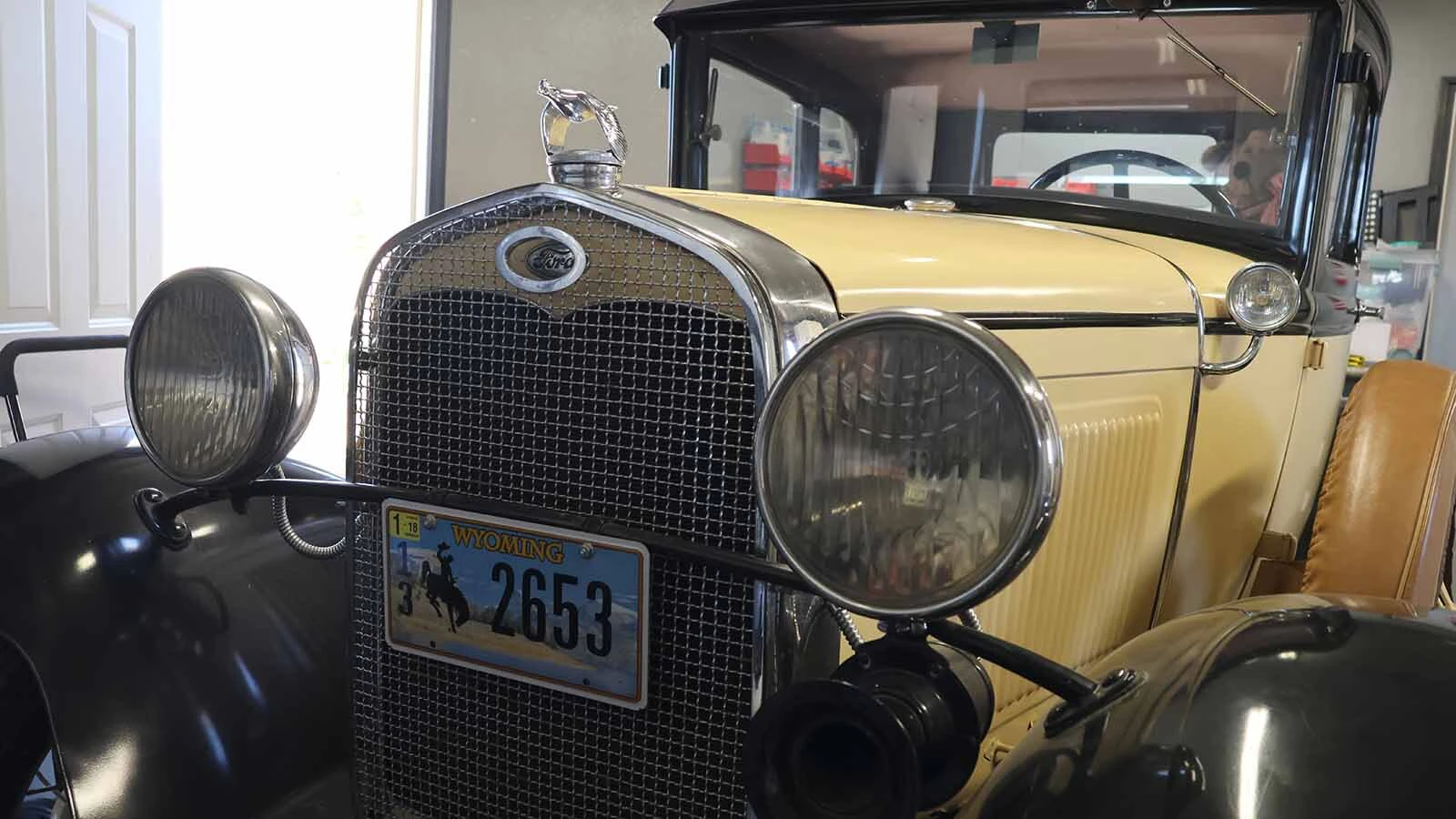 The 1931 Model A features a winged bird as a hood ornament.
