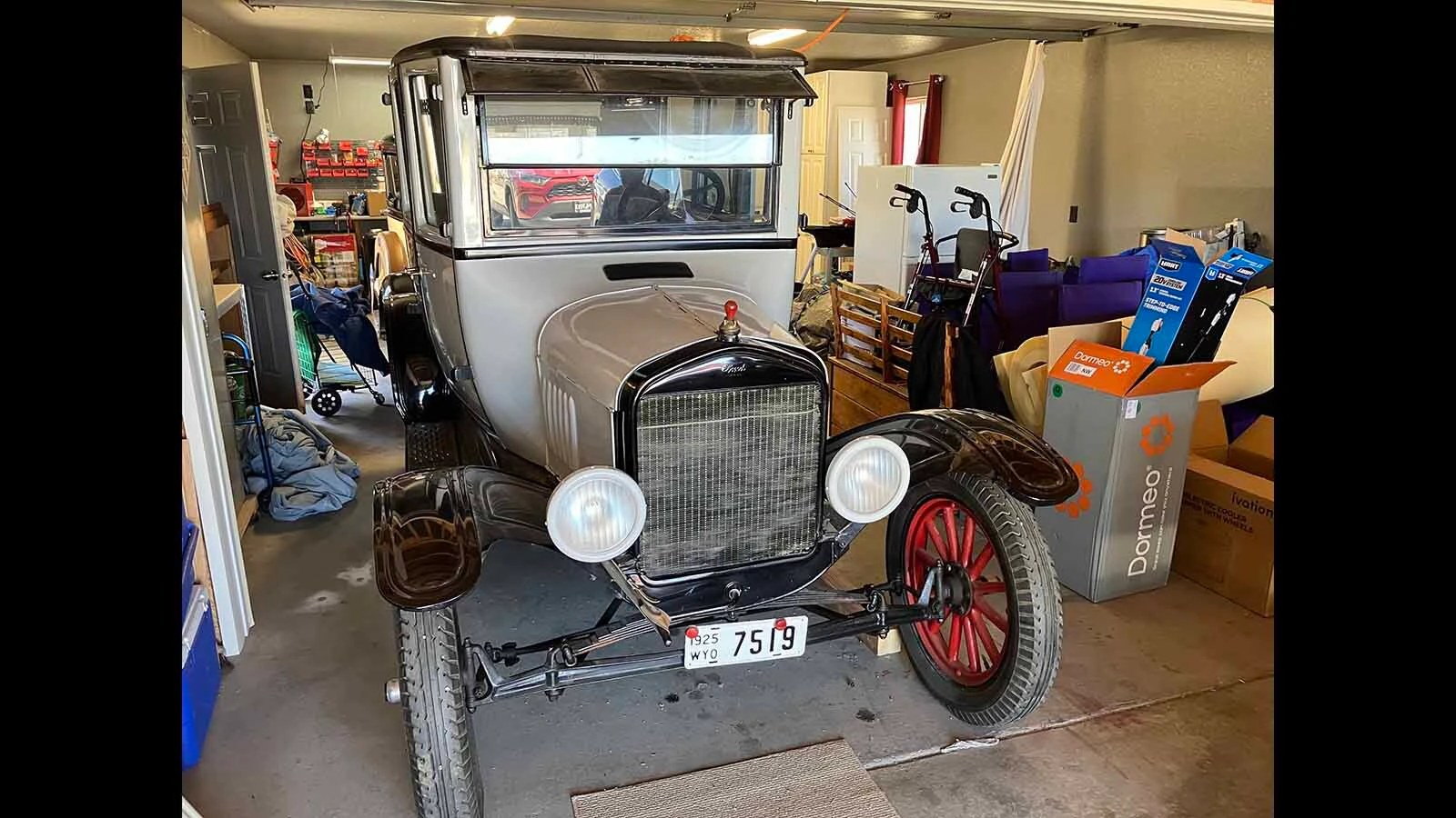The 1925 Model T Opera car was so named due to its plush interior. This one comes with a spray bottle to keep the engine cool during parades.