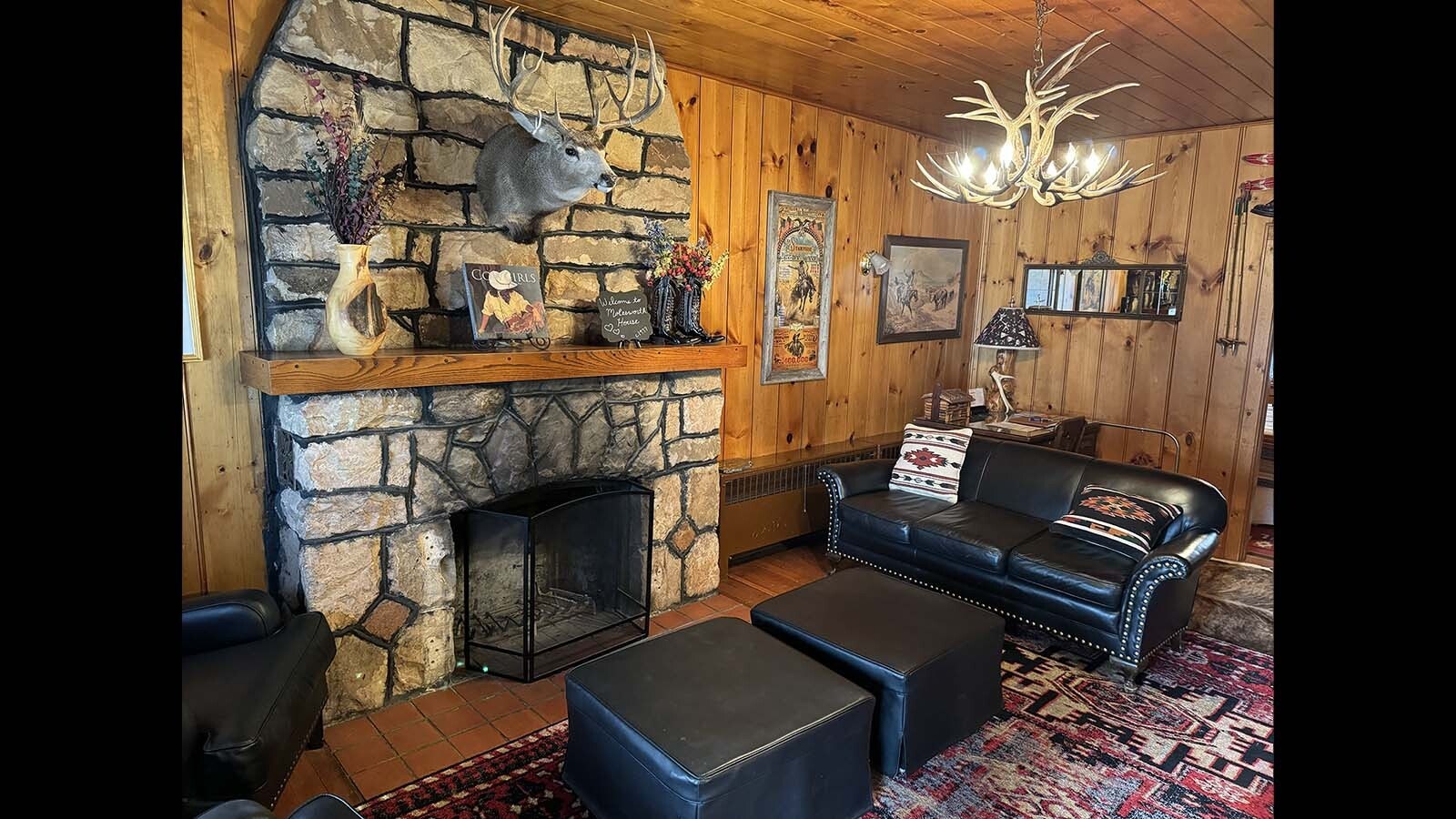 The living room of the Molesworth House oozes Wyoming and signature Western flair.