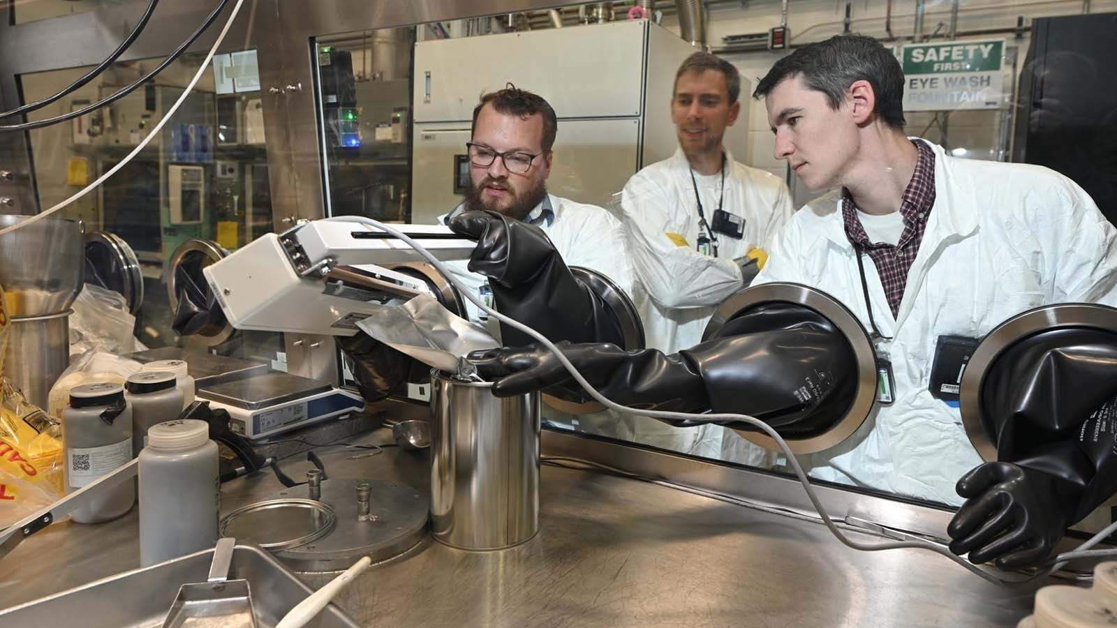 Scientists at Idaho National Laboratory, from left, Bill Phillips, Jacob Yingling, and Michael Woods, conducting research for the Molten Chloride Reactor Experiment.