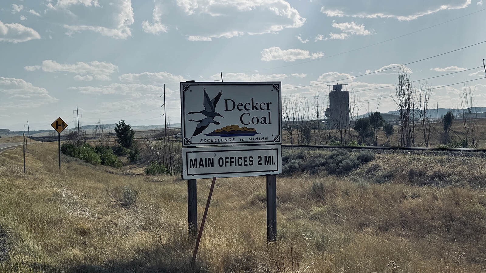 The shuttered Decker Coal operations, which closed down in 2021, are located along the 30-mile drive from Sheridan, Wyoming, to the Tongue River Reservoir State Park in Decker, Montana. The reservoir is being used by planes and helicopters to scoop up water to help extinguish the Remington Fire, which has burned over 130,000 acres from Sheridan to southeastern Montana.