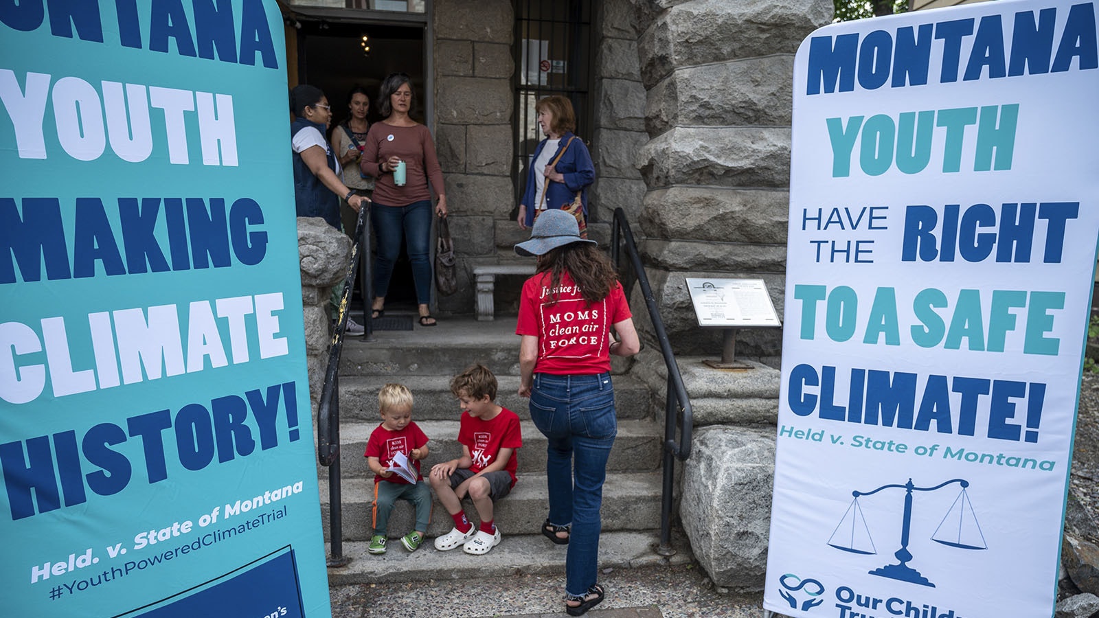Supporters gather at a theater next to the courthouse to watch the court proceedings for the nation's first youth climate change trial at Montana's First Judicial District Court in Helena, Montana.