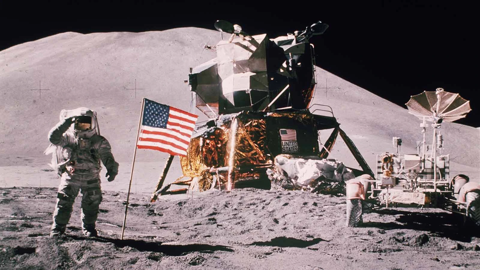 Astronaut James Irwin salutes in front of the landing module of the Apollo 15 on the moon in August 1971.