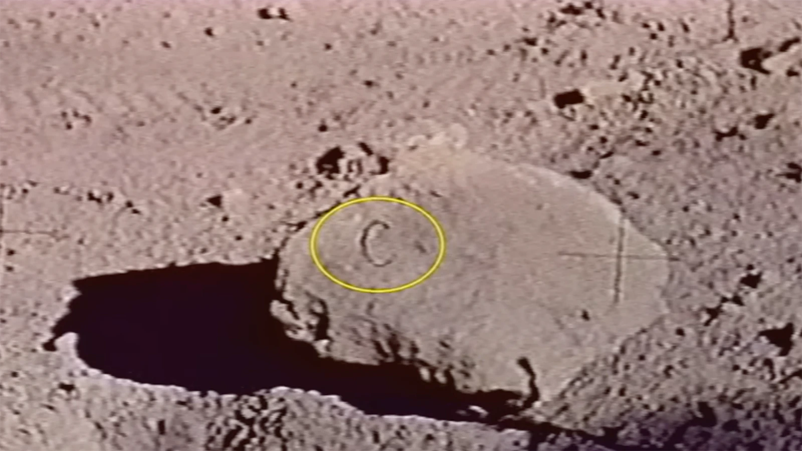 A photo of a rock on the lunar surface with a marking that appears to be a “C” likely indicates it is a prop, Bart Sibrel believes.
