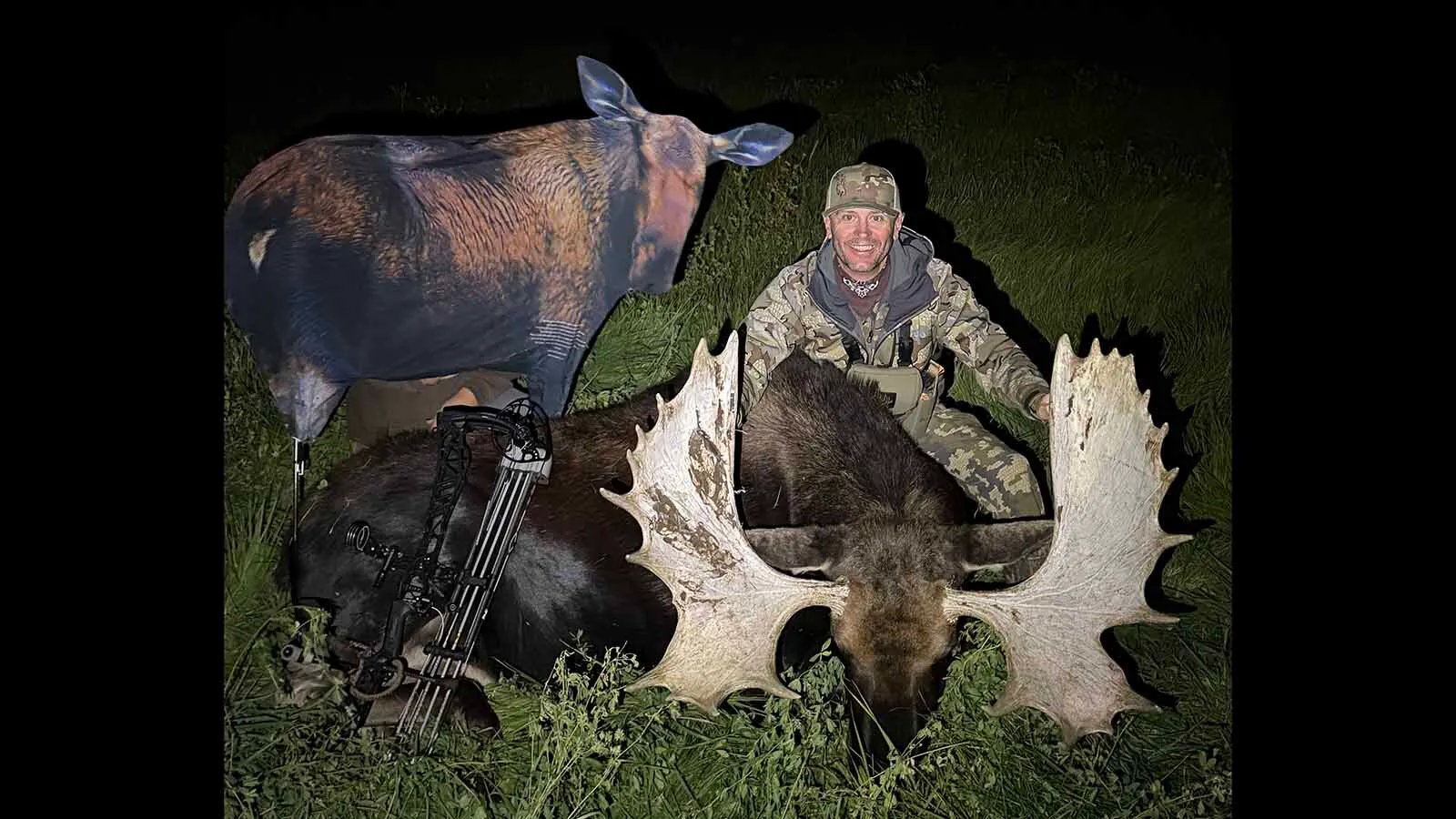 Bowhunter Zach Key held a 2D moose decoy in front of him to cross an alfalfa field during his hunt for this huge bull moose in southwest Wyoming.