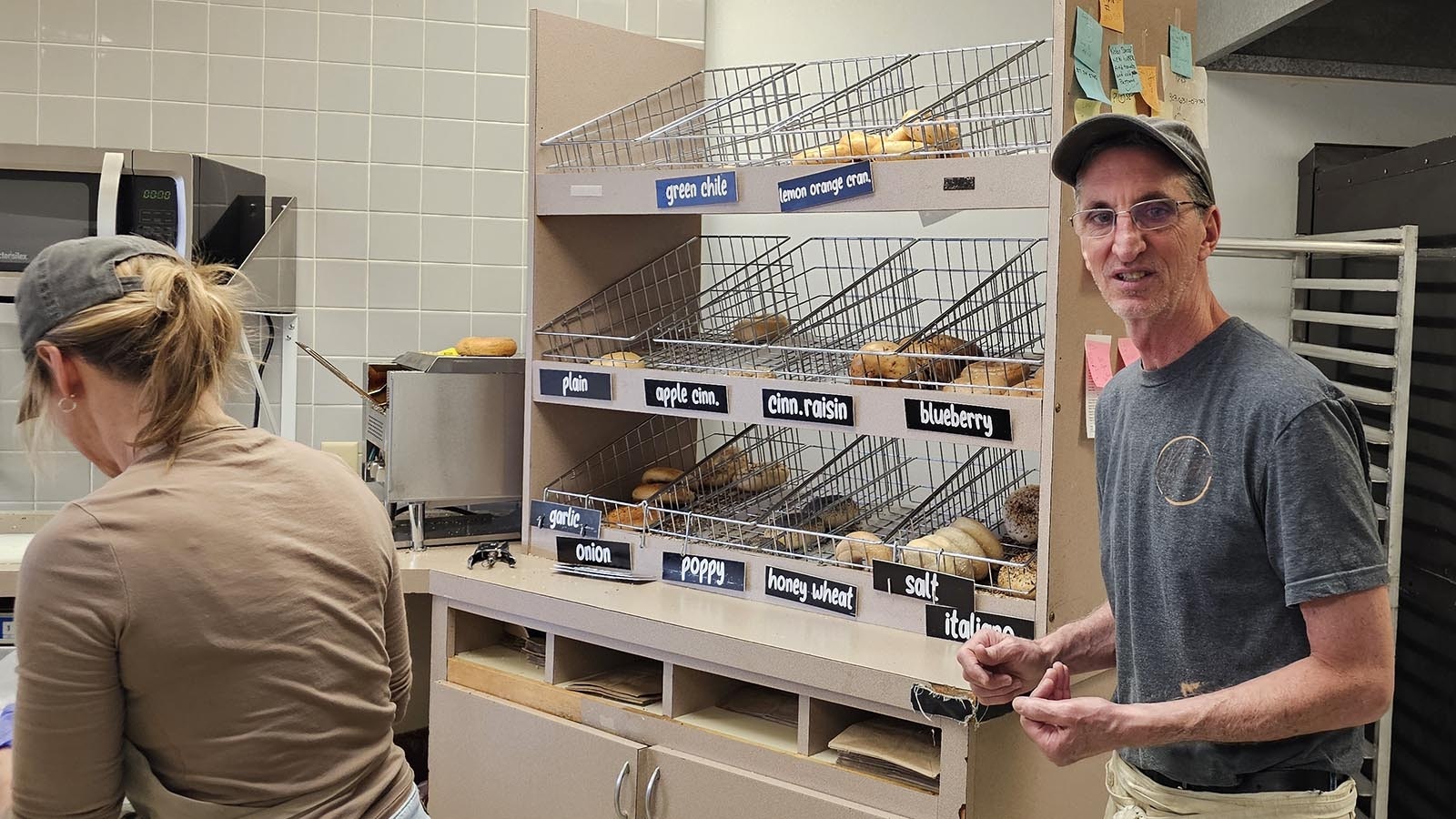 Bill Snow, owner of Mort's Bagels, checks on the bagel bins at the end of the day. It's his goal to have some left over at the end of each day, so that no customer drives downtown to his shop only to find the store is sold out. Extras are given away to businesses in the area or to Comea, Cheyenne's homeless shelter.