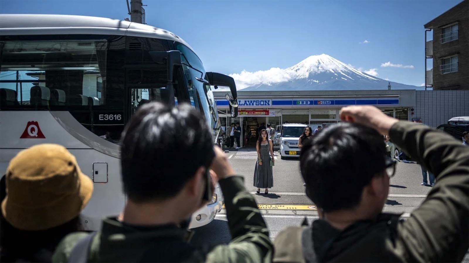 Residents in the Japanese town of Fujikawaguchiko became so tired of being overwhelmed with tourists stopping to take photos of Mount Fuji they decided to block the coveted view. Here's what it looked like before.