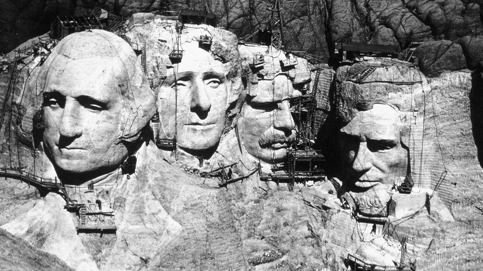 The memorial at Mount Rushmore, South Dakota, under construction in this undated photograph. The four heads are those of Presidents George Washington (1732-1799), Thomas Jefferson (1743-1826), Theodore Roosevelt (1858-1919) and Abraham Lincoln (1809-1865).