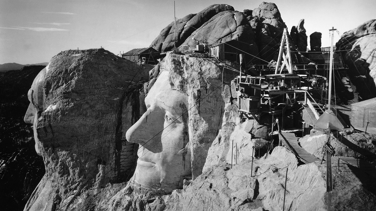 The heads of Washington and Jefferson seen from the top of Lincoln's head during construction of the monument in this undated photograph.