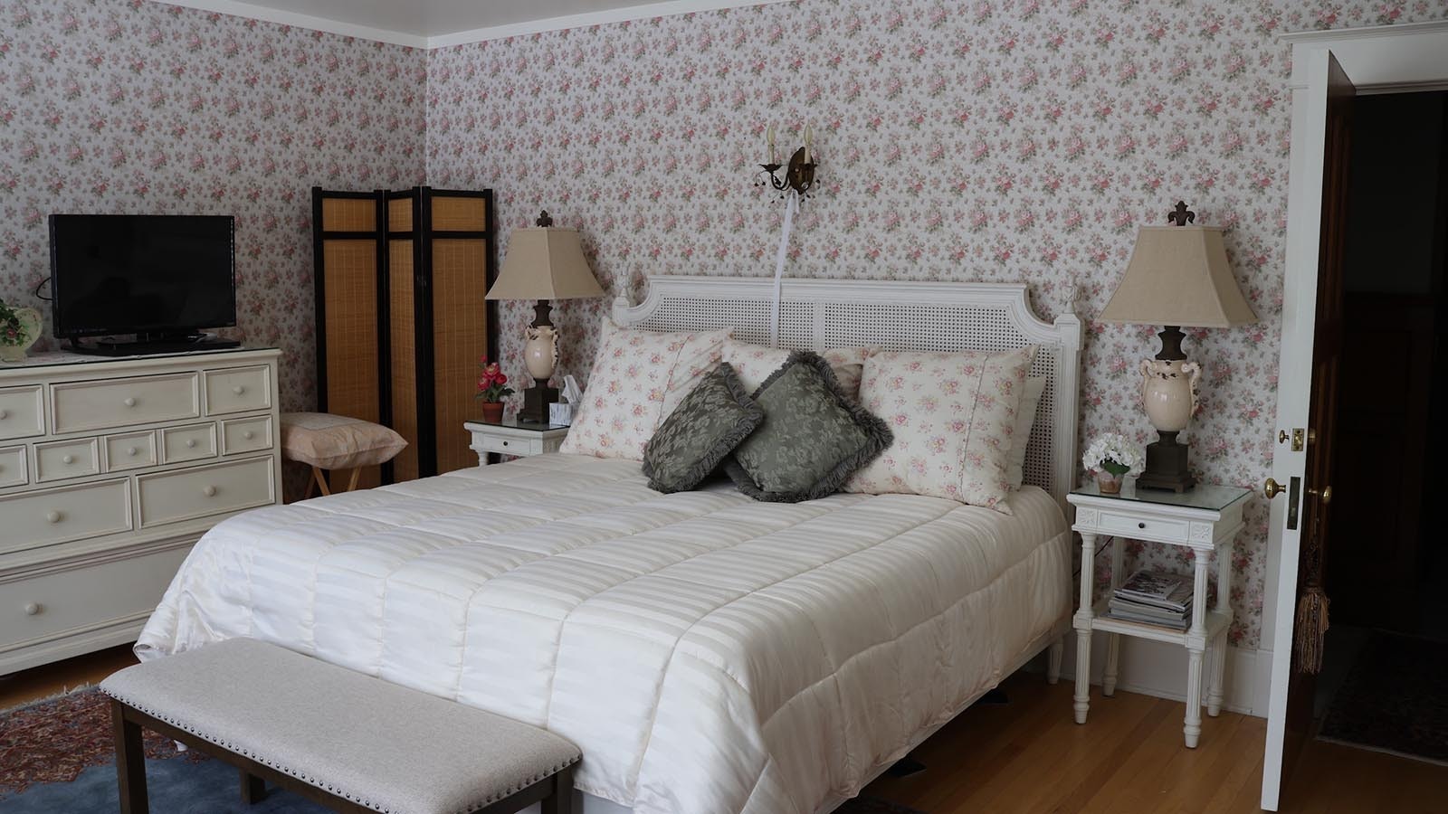 The bedroom built for Catherine Lyman features original wallpaper and its own bathroom.