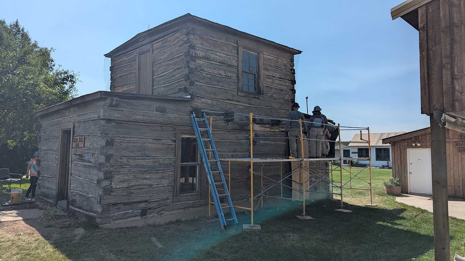 HistoriCorps has arrived and is working to save Jim Bakers cabin which has several rotten logs.