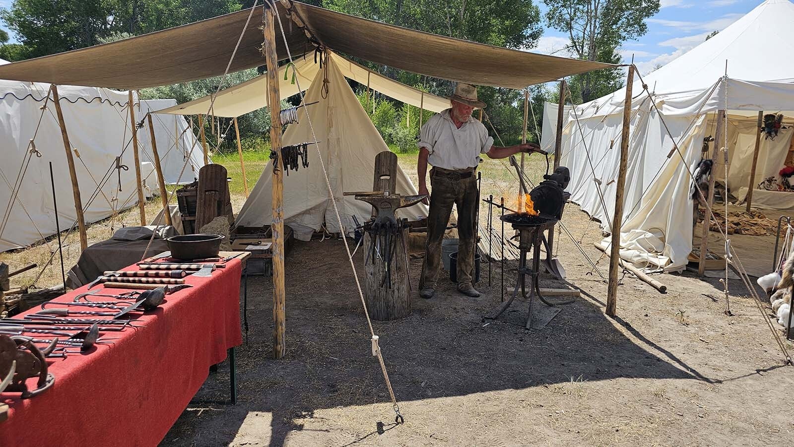 A demonstration of blacksmithing at the 1938 Mountain Man Rendezvous in Riverton.