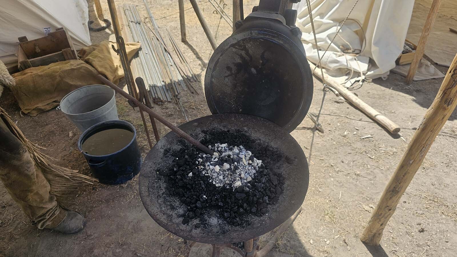 A portable blacksmith's forge at the 1838 Riverton Rendezvous, now through July 6.