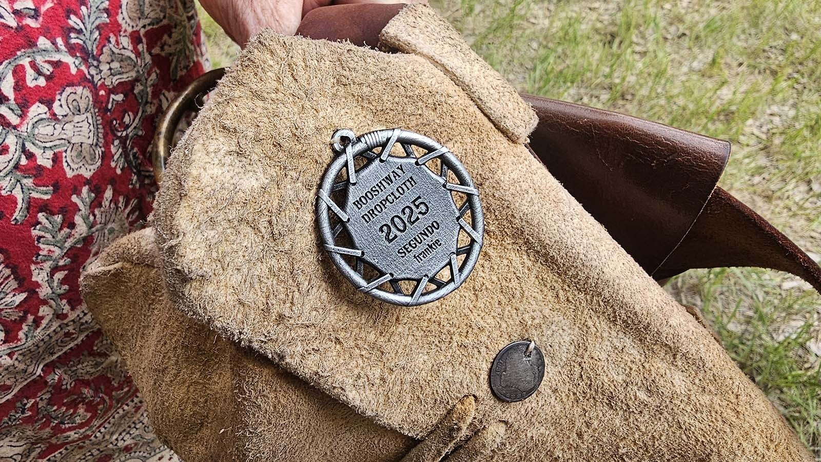 One of Booshway Jack's many medals, displayed on a leather bag he wore during the 1838 Riverton Rendezvous.