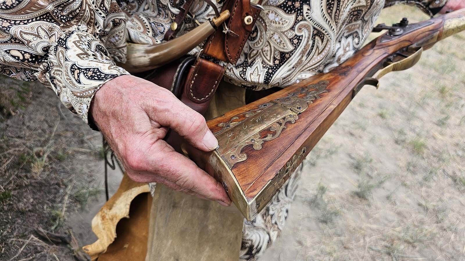 A closeup of Broken Water's custom mountain man rifle. The secret compartment holds cleaning supplies.
