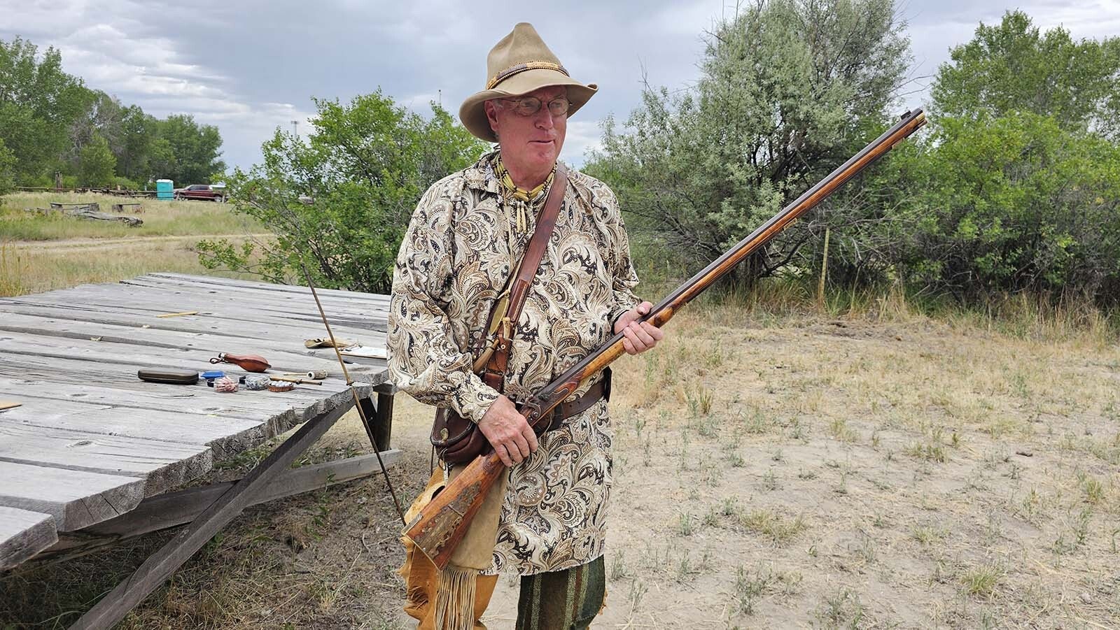 Broken Water with his custom rifle, in his mountain man attire at the 1838 Riverton Rendezvous.