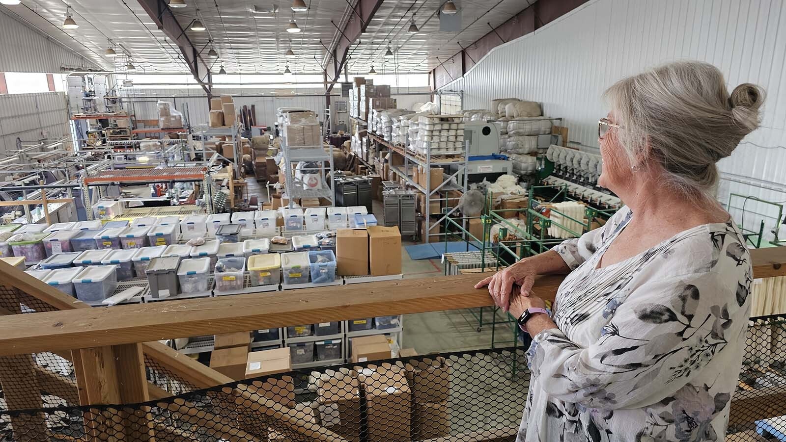 Karen Hostetler, owner of Mountain Meadow Wool, looks out over the floor of a business that started as a small hobby business and grew to become the West's largest wool mill.