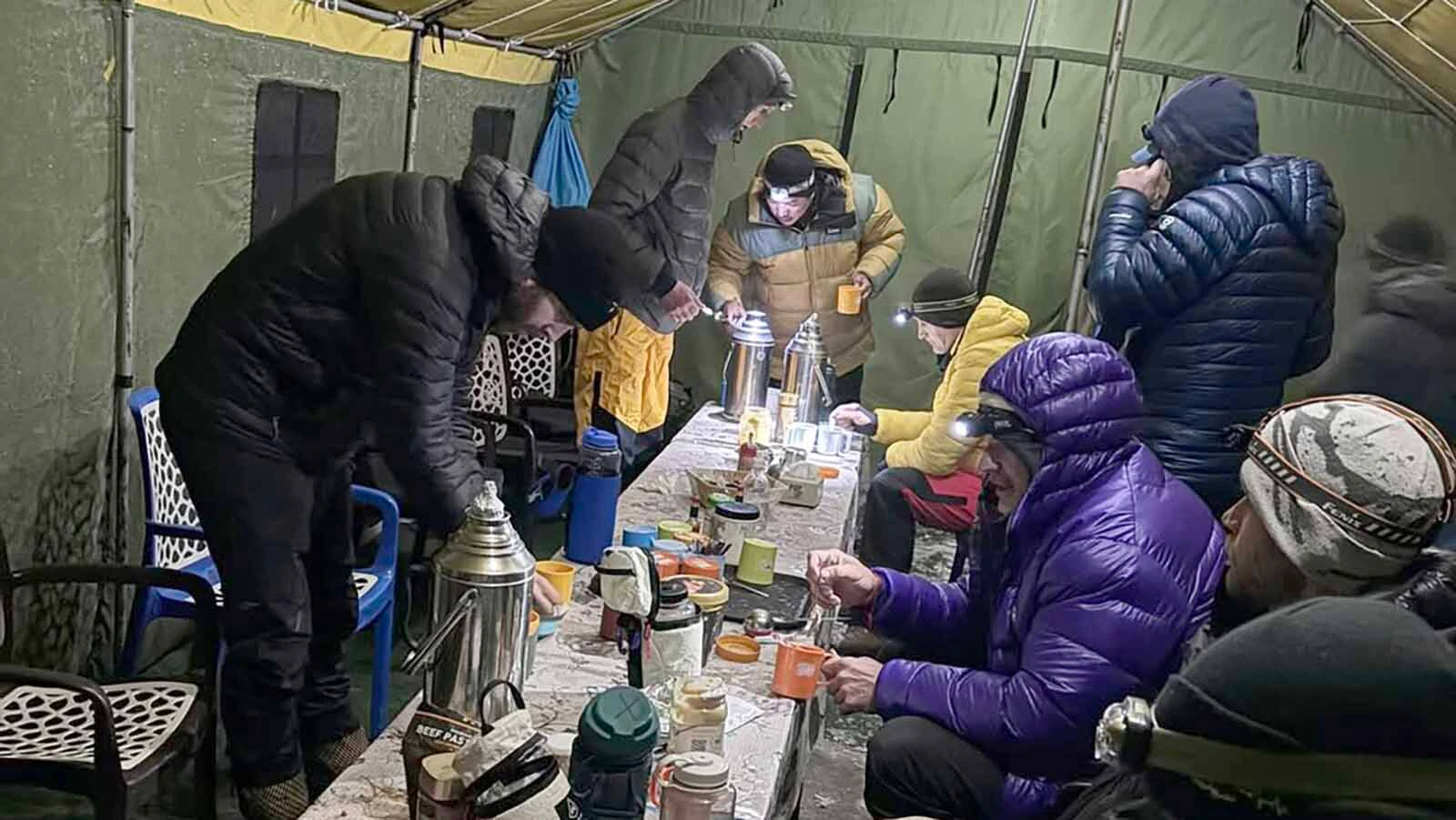 Climbers fuel up in preparation for their summit of Lobouche East.