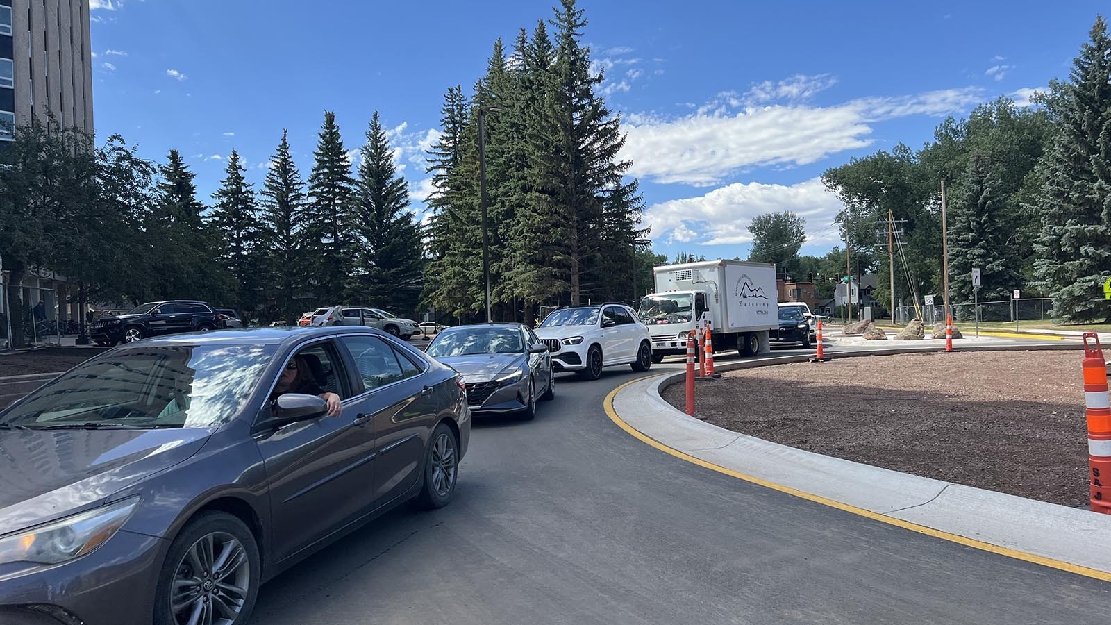 On move-in day Friday, vehicles are backed up in a new roundabout at the intersection of 15th and Ivinson Streets on the University of Wyoming campus in Laramie.