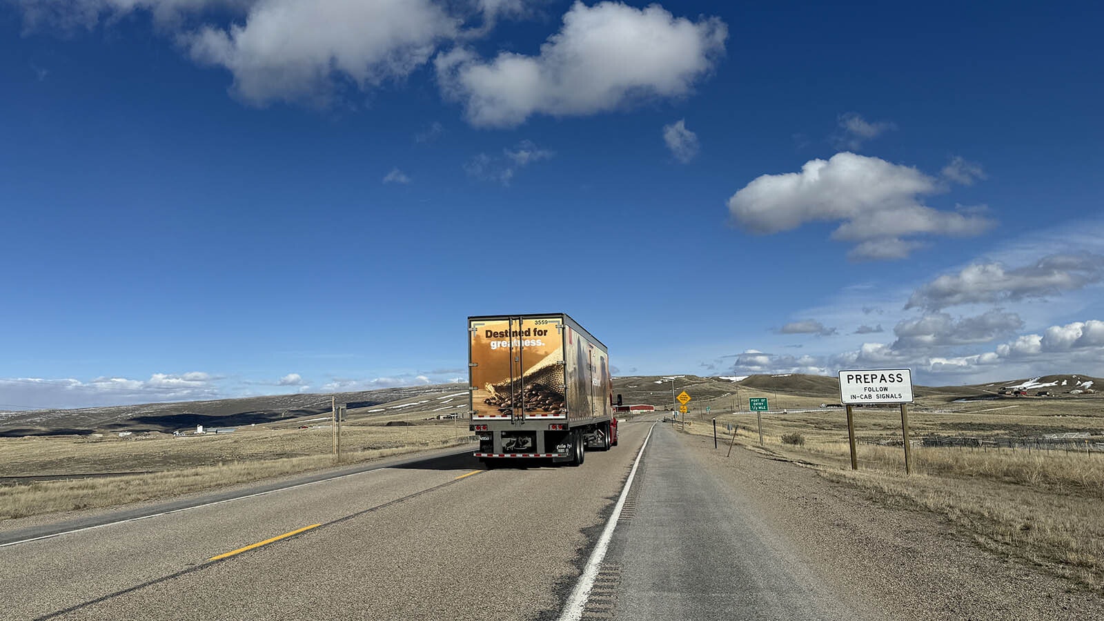 A 2.71-mile stretch of US Highway 30 near the Kemmerer port of entry will be realigned to the north so that a coal mine operator can access more than 9 million tons of coal reserves.  The road will be moved to the left of the truck that is heading toward the port of entry.