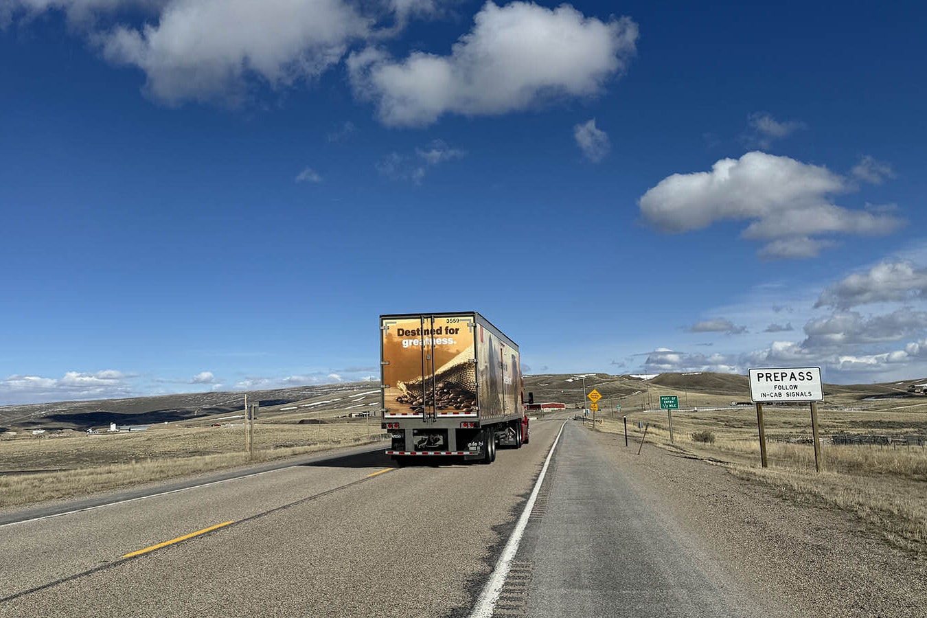A 2.71-mile stretch of US Highway 30 near the Kemmerer port of entry will be realigned to the north so that a coal mine operator can access more than 9 million tons of coal reserves.  The road will be moved to the left of the truck that is heading toward the port of entry.