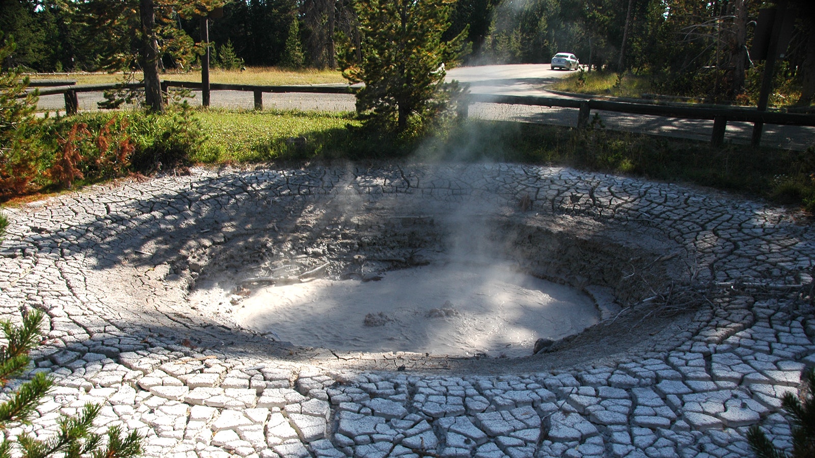 Nobody knows when or how "Infrastructure Spring" appeared in Yellowstone's West Thumb Geyser Basin, but it's one of the most unique thermal features in the park. The water that created the mudpot flows through old pipes.