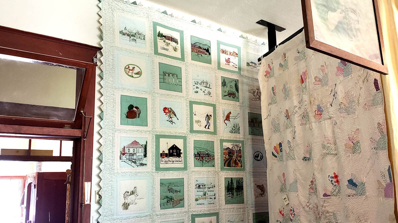 This quilt showcases the buildings and history of the Little Snake River Valley.