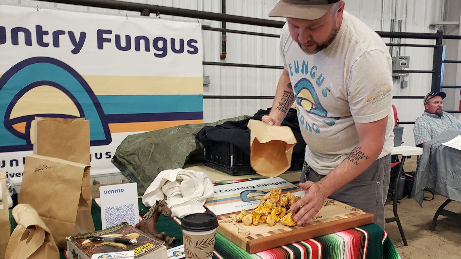 Dan Stewart empties a bag of chanterelles at a booth during the Rendezvous City Beef Roundup in Riverton.
