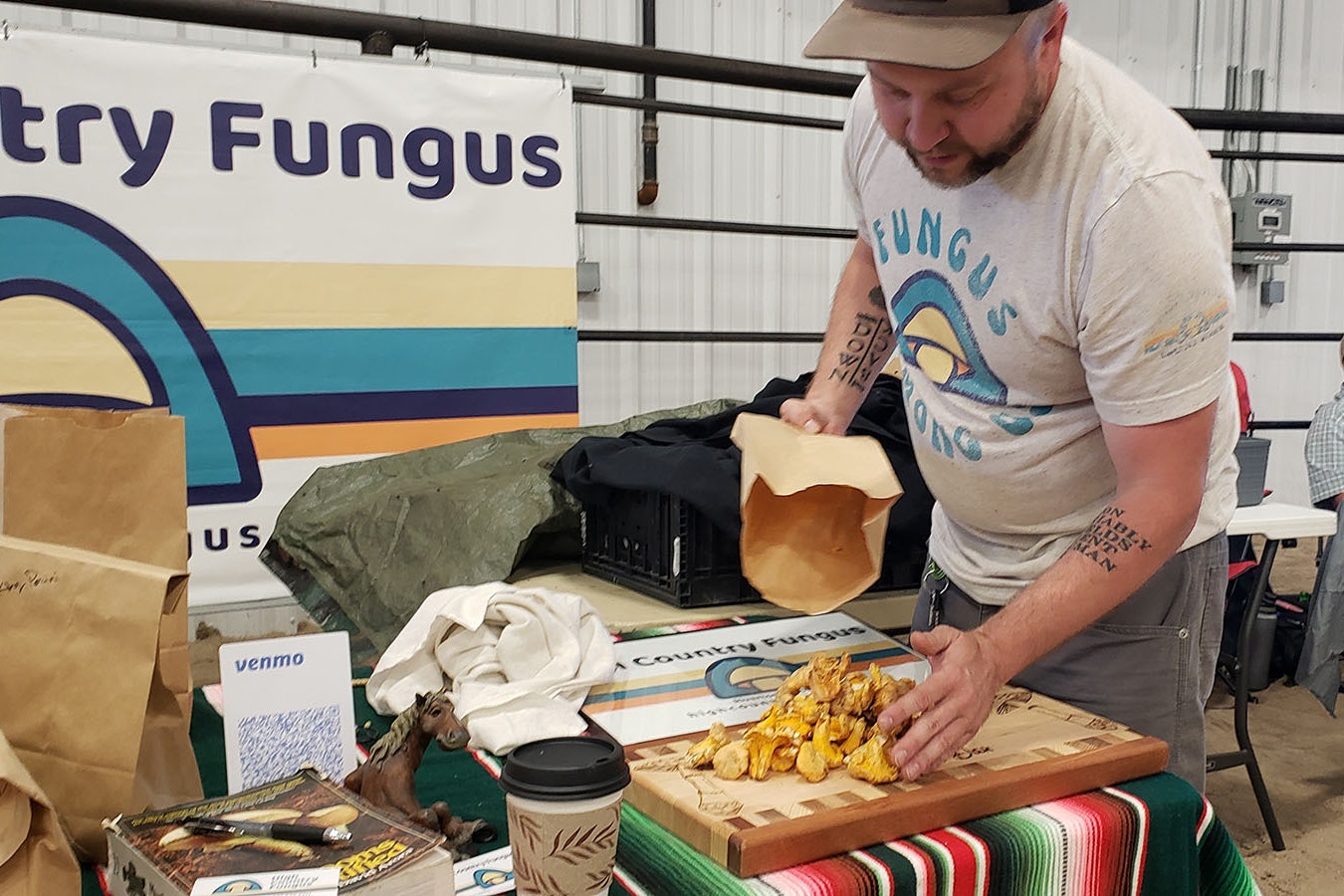 Dan Stewart empties a bag of chanterelles at a booth during the Rendezvous City Beef Roundup in Riverton.