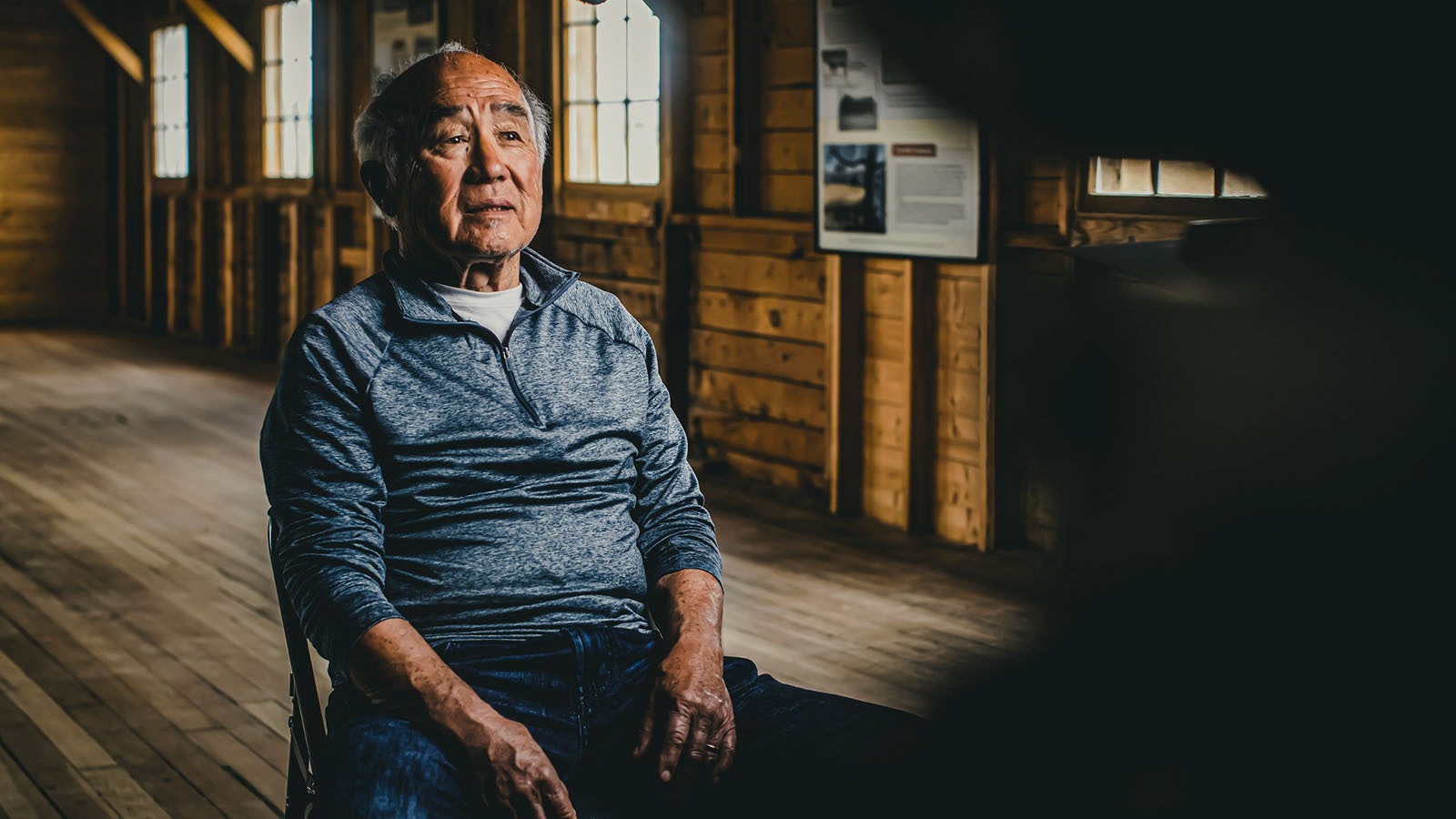 Rodney Fujita being interviewed at the Heart Mountain Interpretive Center for the NFL documentary "9066: Fear, Football, and the Theft of Freedom." Fujita was born at the Gila River War Relocation Center in Arizona.