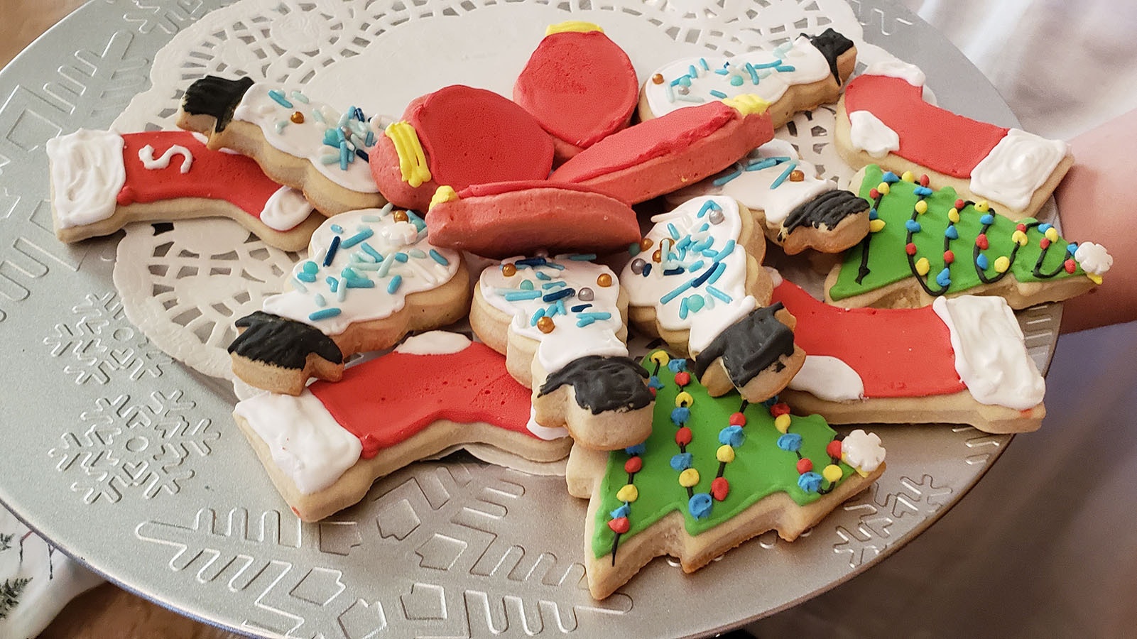 A plate of delicious sugar cookies decorated for the holidays.