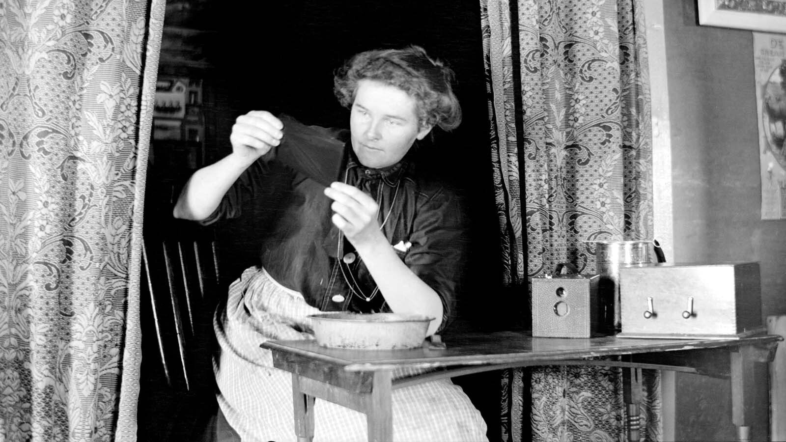 Lora Webb Nichols at work in Encampment.