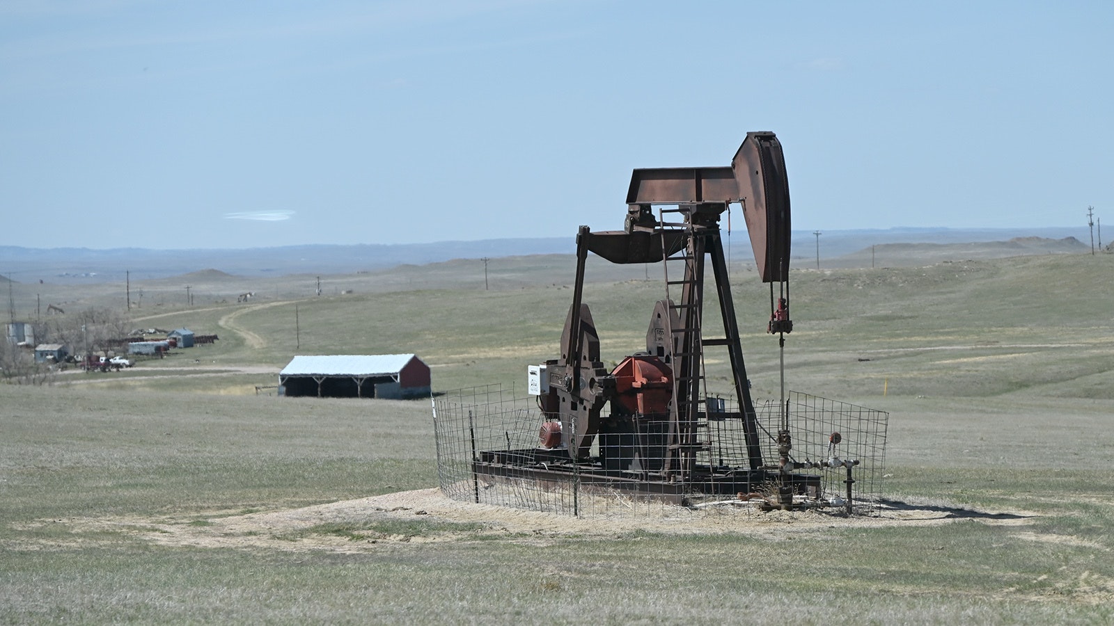 An M&K Oil Co. pumpjack works an aging vertical well in Weston County.