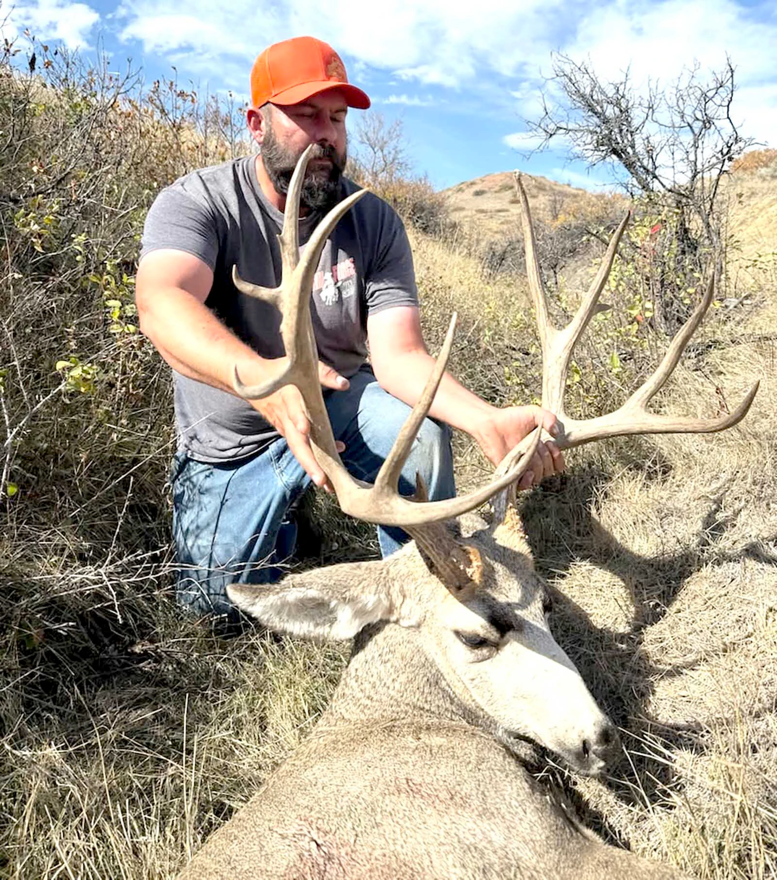 Nathan Hunter says he practically stepped on this big mule deer buck before the buck jumped up, giving him a shot opportunity.