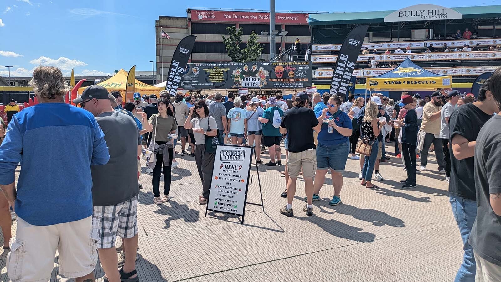 It's mid-day on the second day of the National Buffalo Wing Festival and the line for Double Dub's is now very packed.