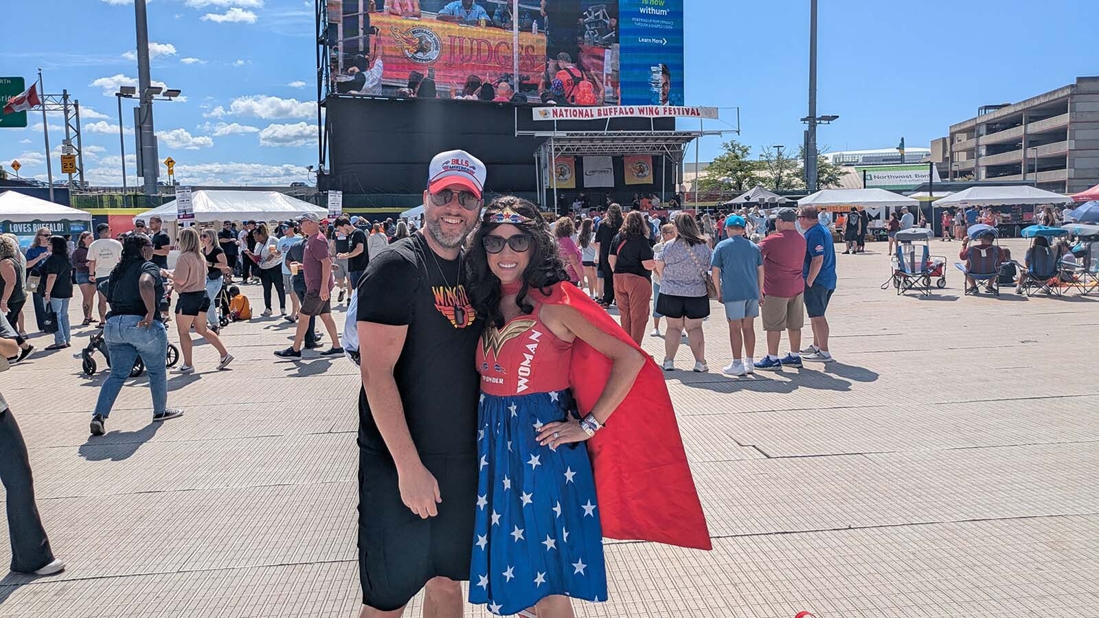 The festival's not enough for Matt and Nicole Martin, aka Bills Wonder Woman, who ordered a tray of 100 wings from Double Dub's to take home.