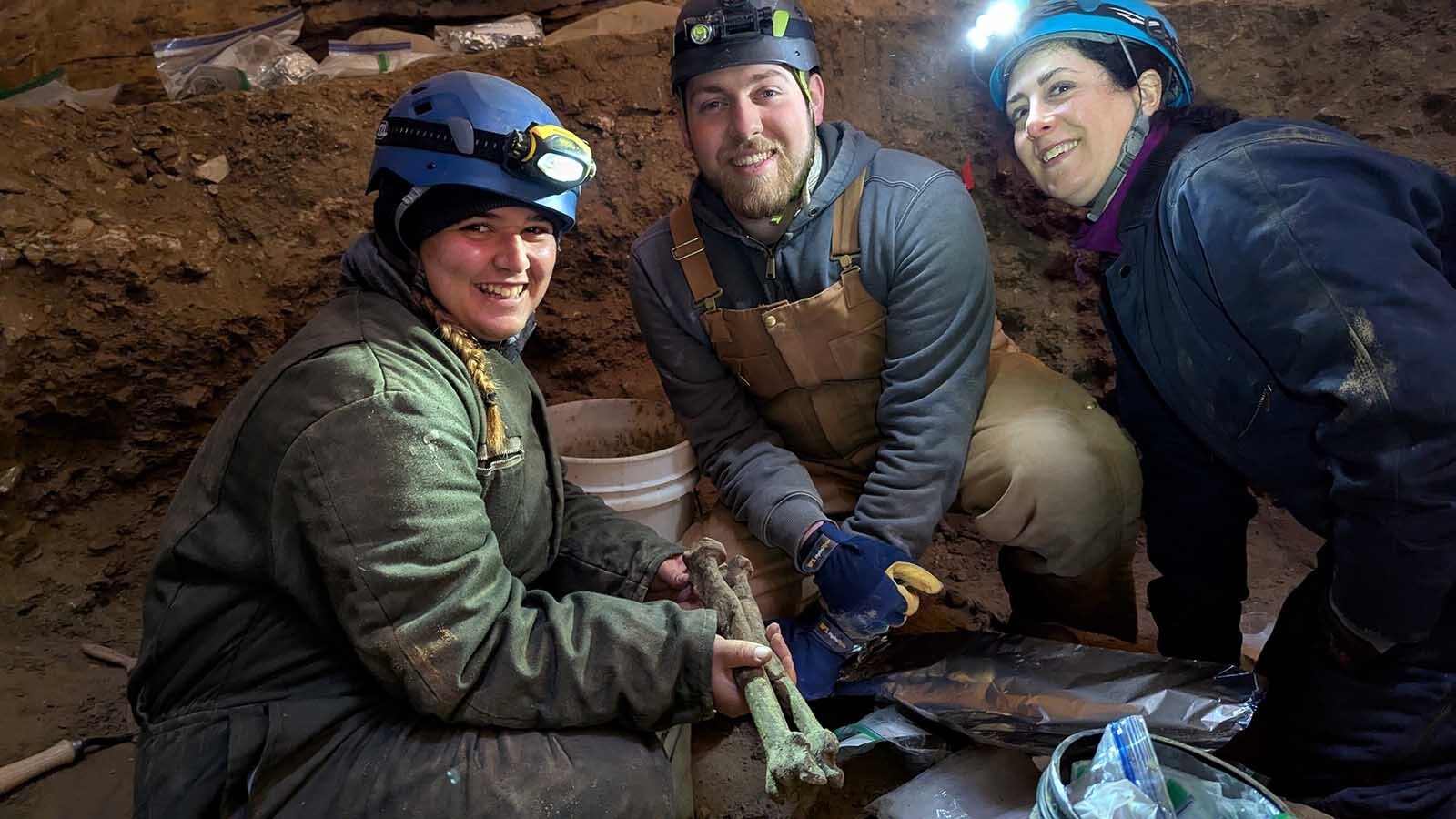 Sierra Bornheim, Adam Fitch, and Julie Meachen with the American lion radius and ulna.