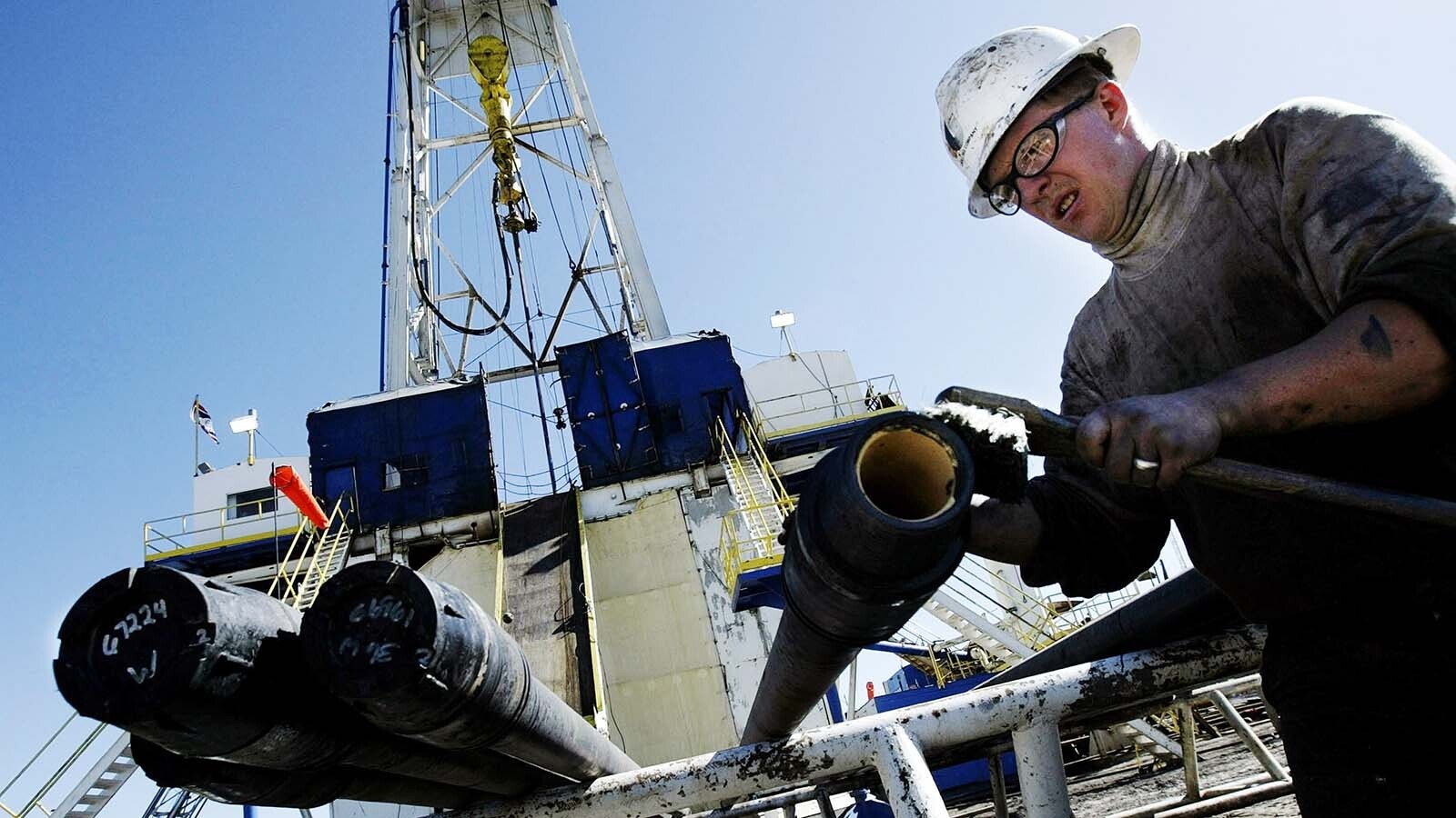 A roughneck works on a natural gas drilling rig north of Evanston, Wyoming, in this file photo.