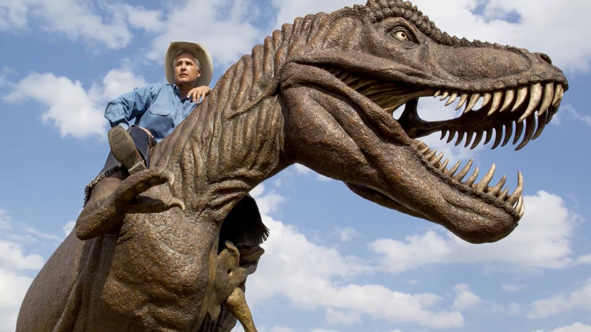 Chris Navarro's 13-foot-high, 28-foot-long T. rex not only is frightening, it lights up.