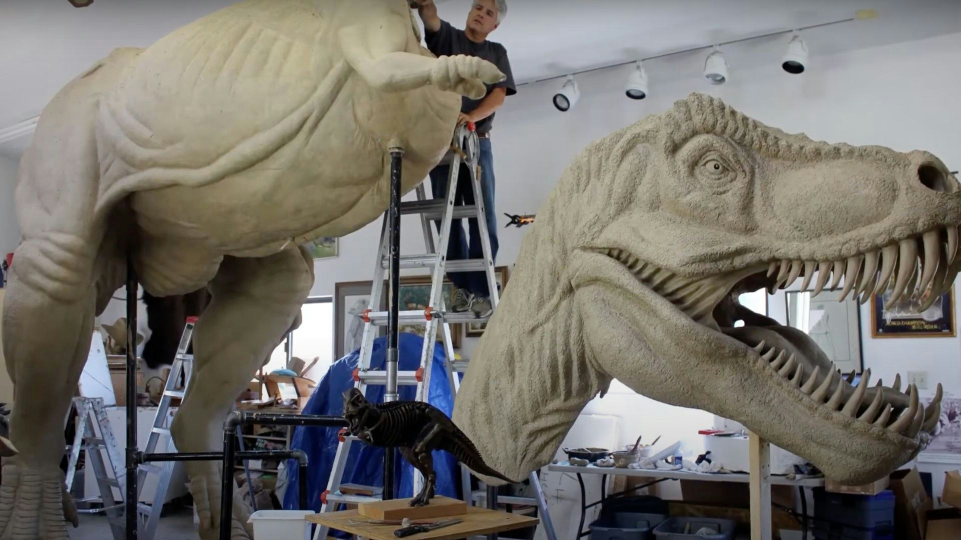 Casper sculptor Chris Navarro works on his giant illuminated T. rex, which now is placed at Casper College.