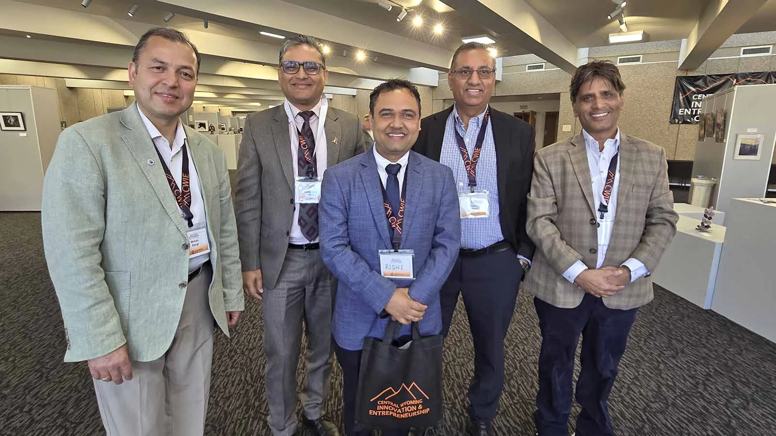 From left, former CWC student Mohan Dangi, Nepal Consul General Lakshuman Kanal, Nepal Deputy Consul General Rishi Raj, former CWC student Ramesh Sedhain, and journalist Shiva Nepal.