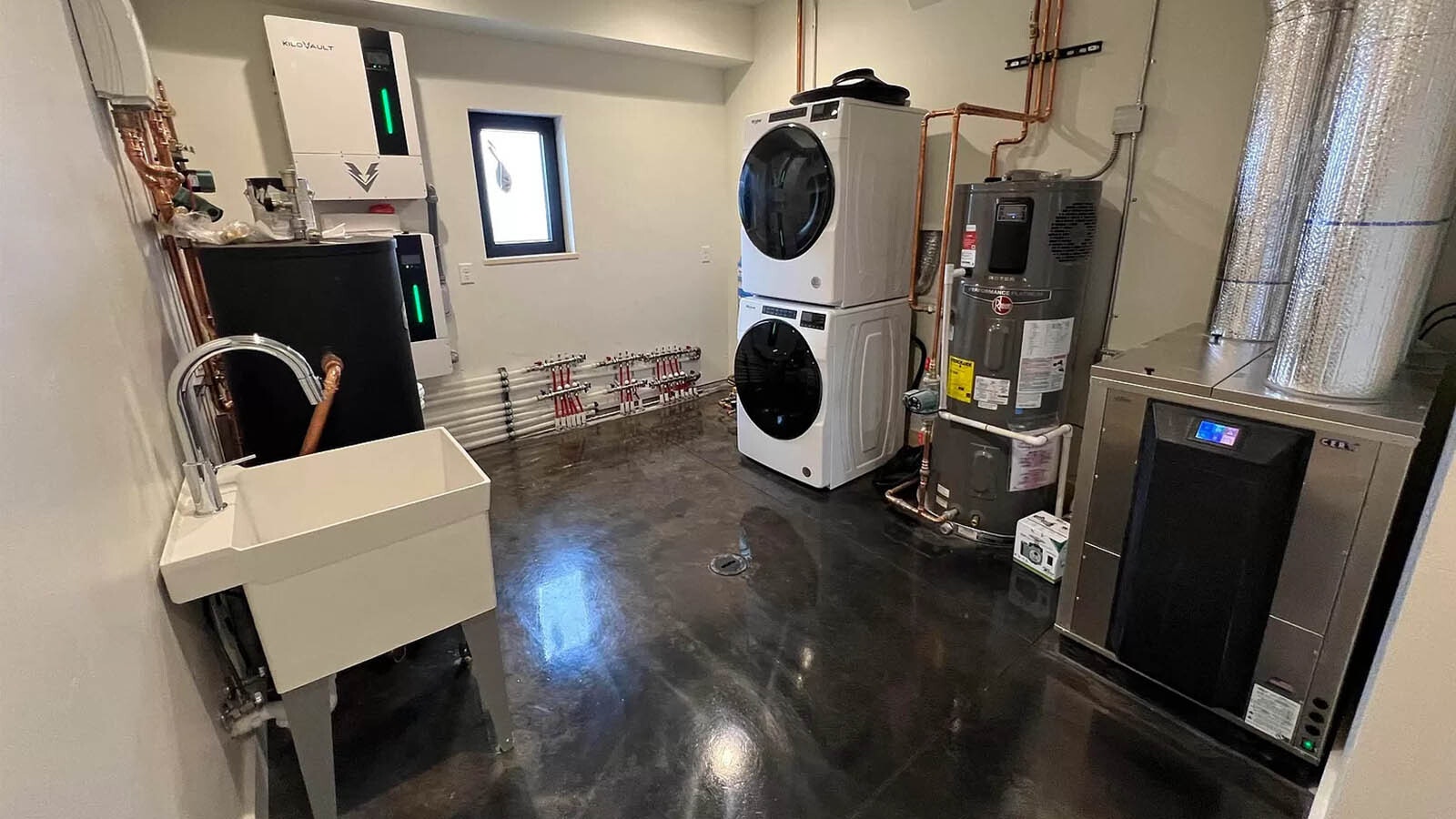 The control room of the house also serves as a laundry room.
