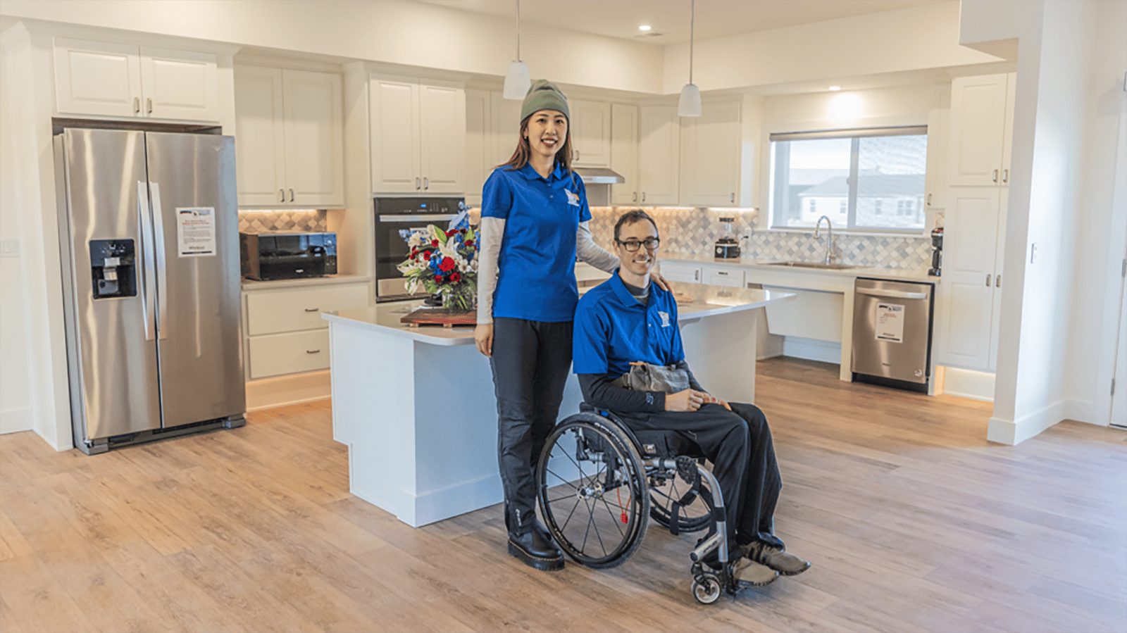 Bryan Price and his wife, Siqi, stand in the kitchen and dining space in their new home southwest of Casper.