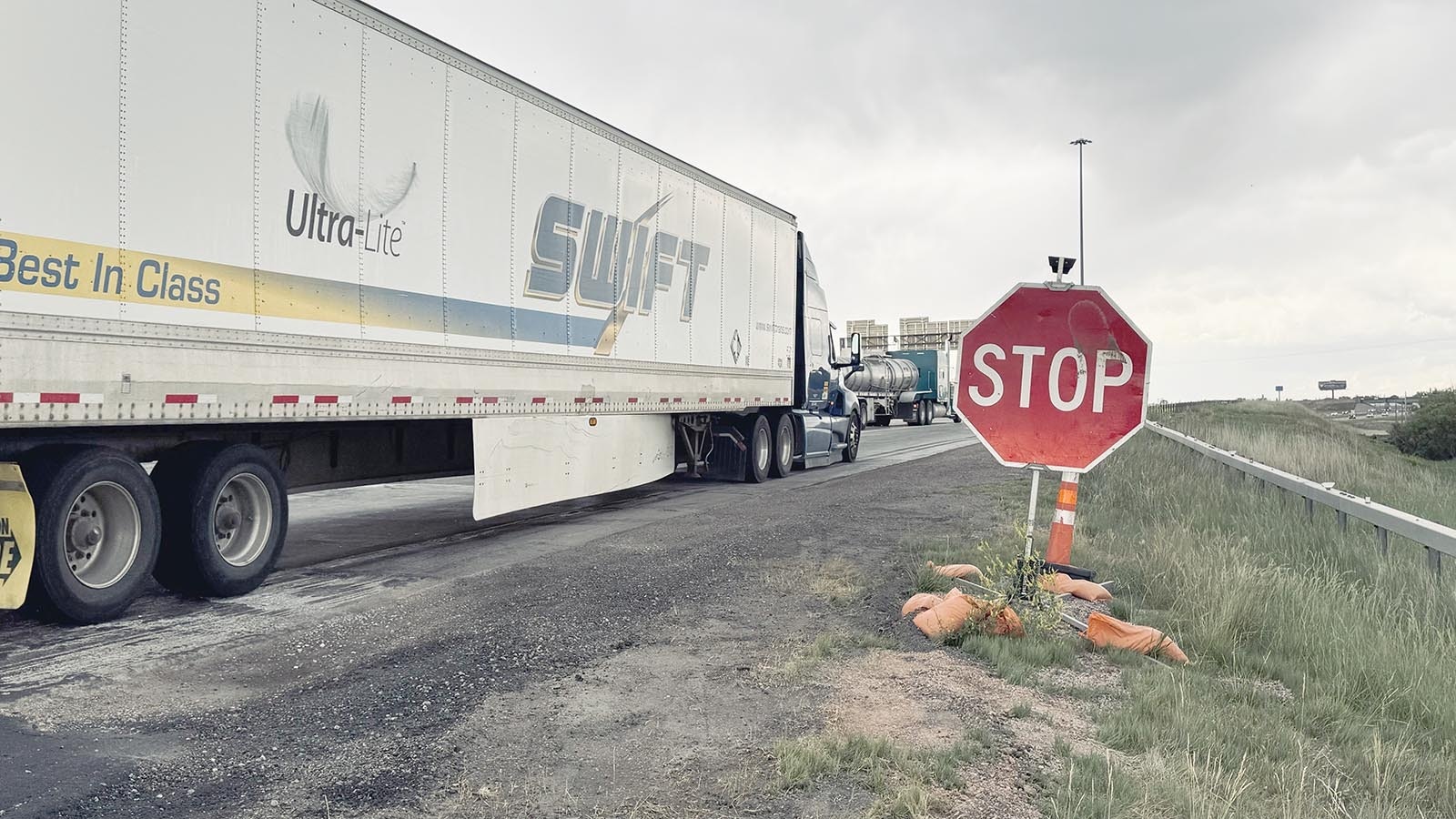 Truckers and commuters were seen running a stop sign located at the Cheyenne interchange when exiting from the northbound lane of Interstate 25 to the eastbound Interstate 80. Traffic has narrowed to a single lane along the I-80, with the stop sign placed at the merging exit from the I-25 to help with traffic flows and avoid potential crashes.